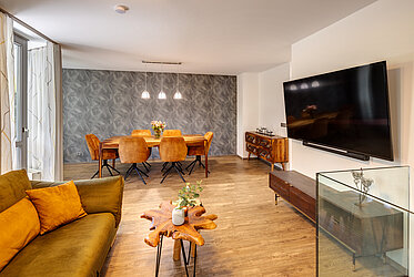 Milbertshofen: elegante apartamento con jardín