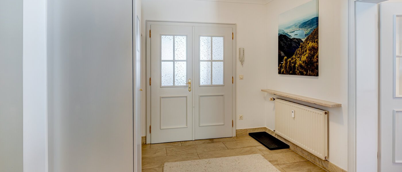 piso con jardín Schliersee 01 pasillo 13576