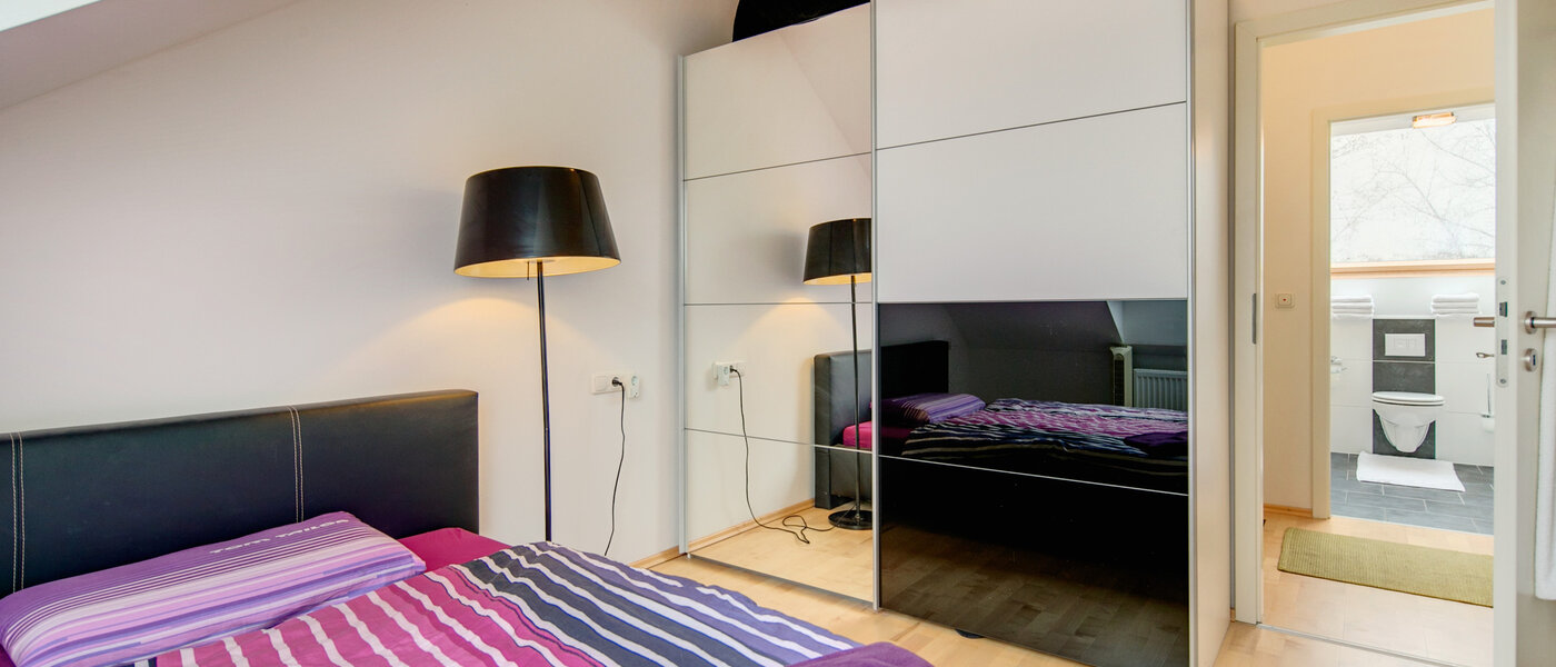 ático con terraza München Untermenzing 03 dormitorio 7372