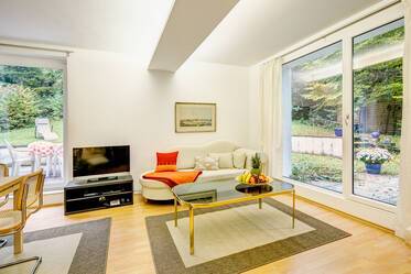 Precioso apartamento con jardín en Gauting-Stockdorf