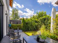 chalet adosado en el medio München Untermenzing 01 jardín 14892