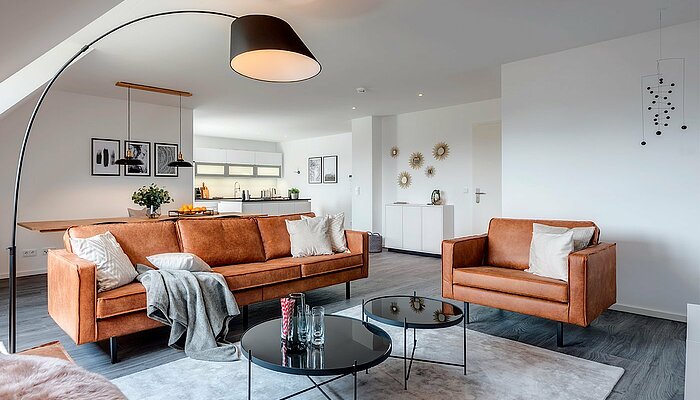 [Translate to spanish:] Eingerichtetes Wohnzimmer